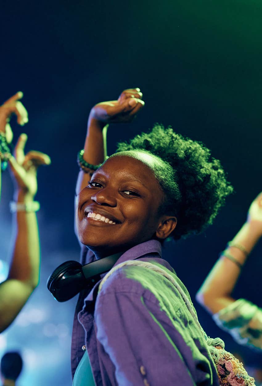 Happy woman at a concert