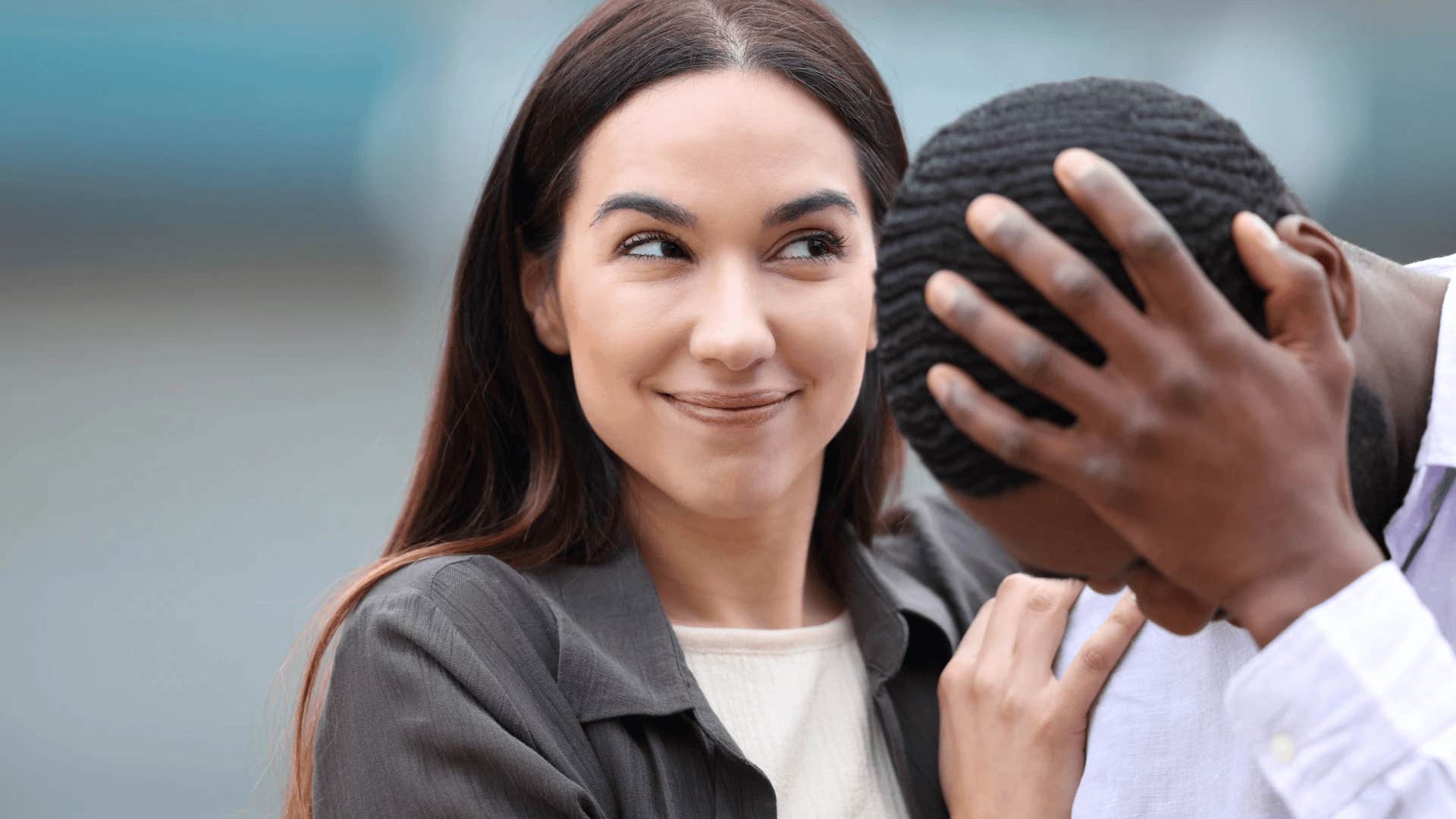 secretly smiling woman with no close relationships