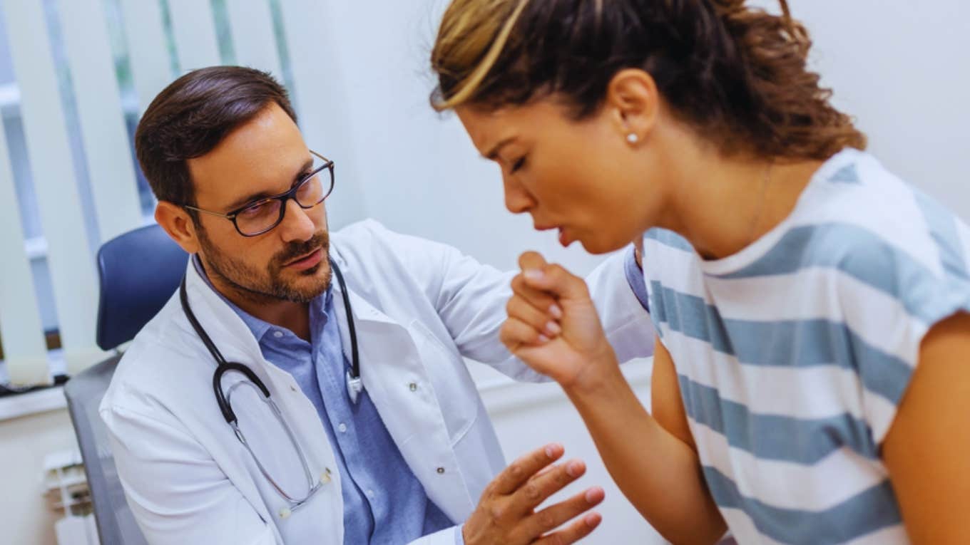 doctor taking care of sick woman