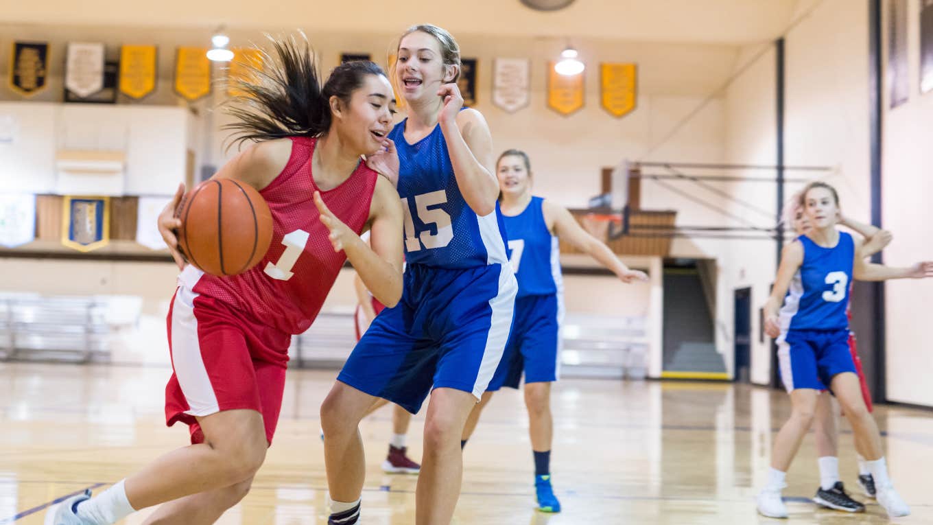 high school girls playing basketball