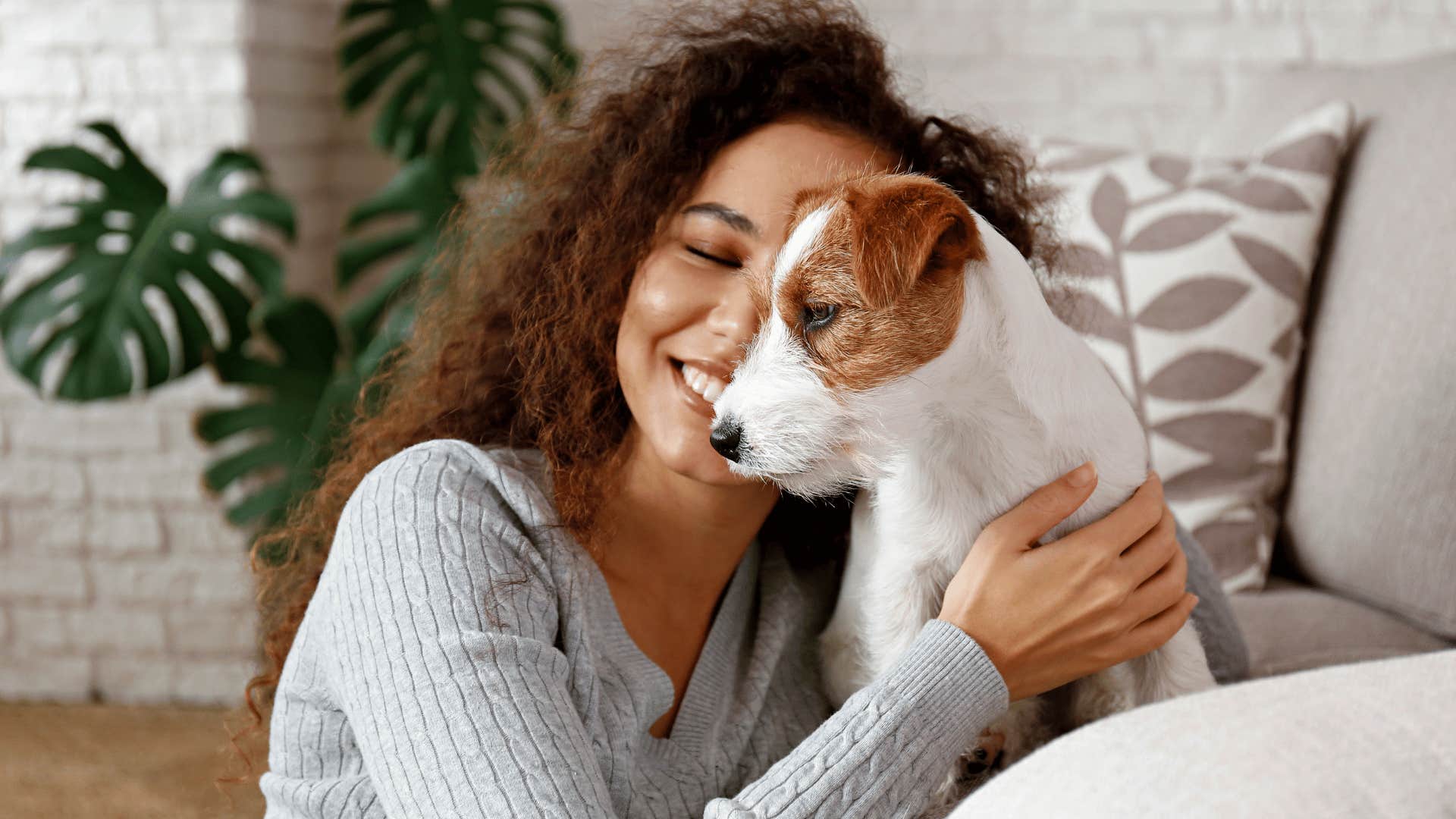 woman with a well-socialized dog