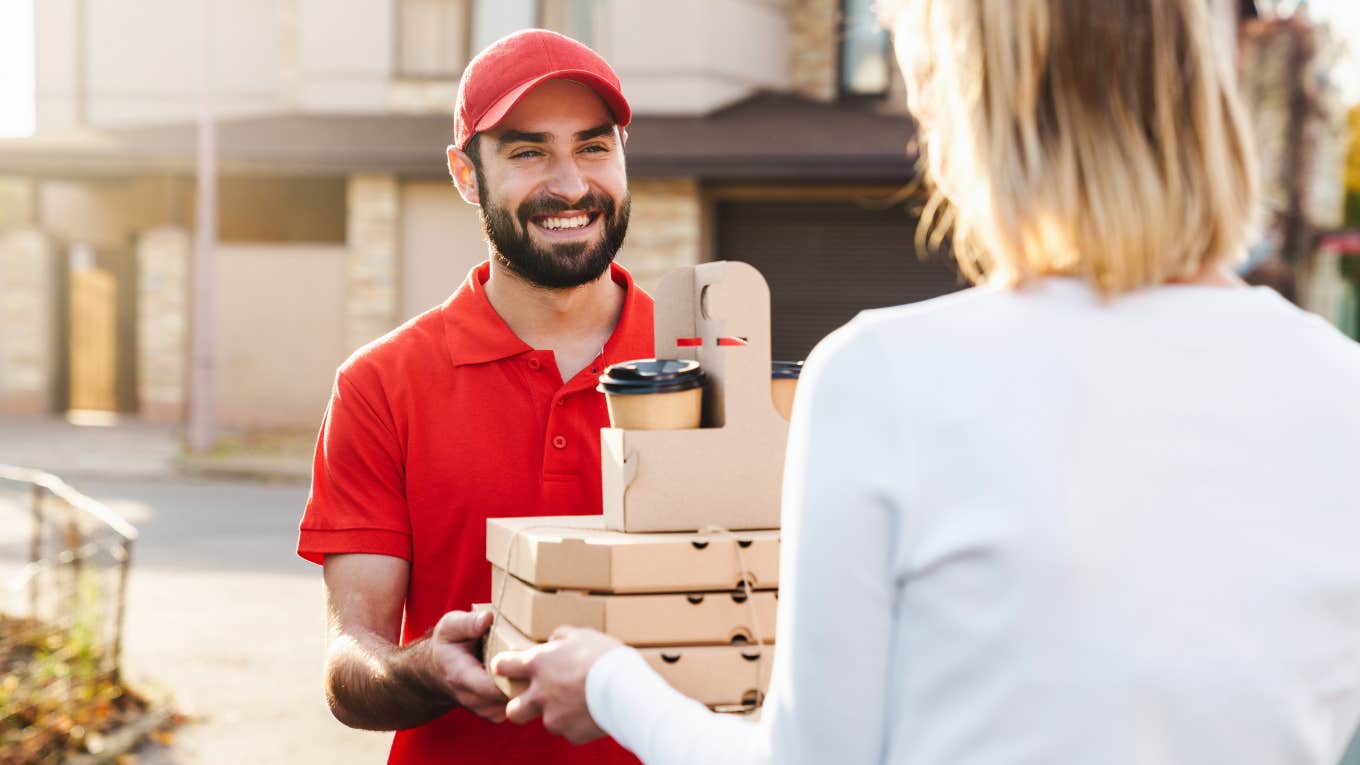 woman getting food delivery