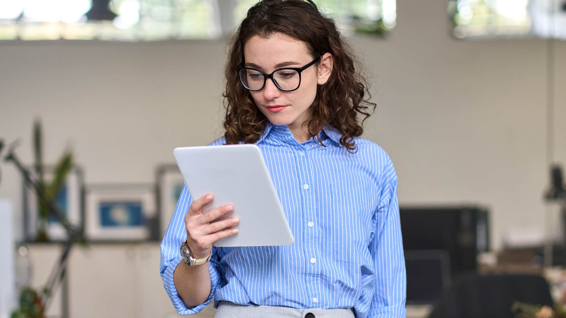 Gen Z woman trying to read cursive writing