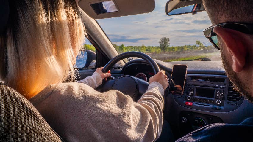 driving in a car with a male passenger princess