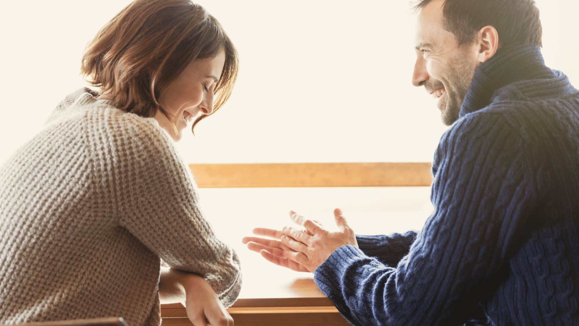 couple smiling and talking