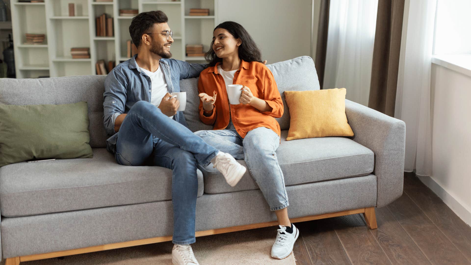 couple talking on couch