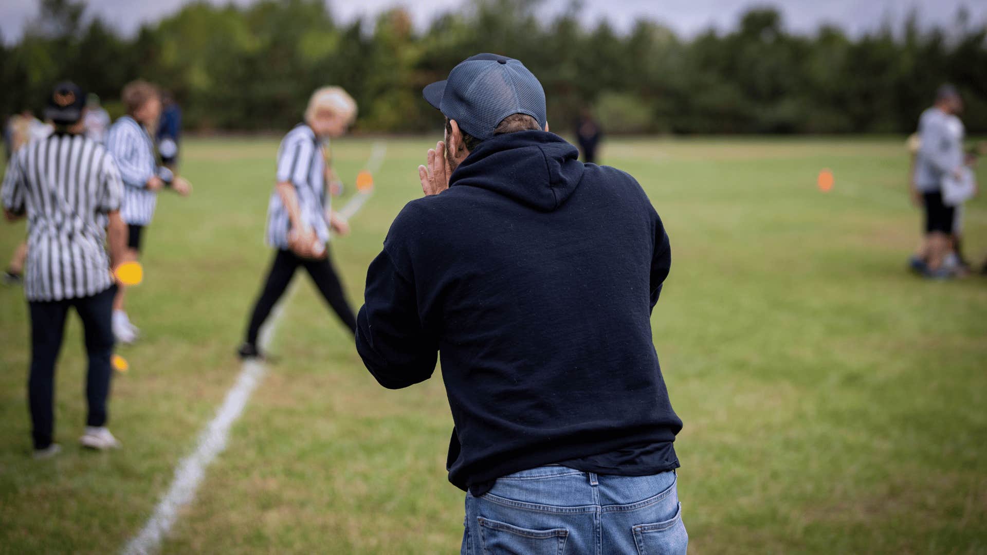 parent yelling at kid's game