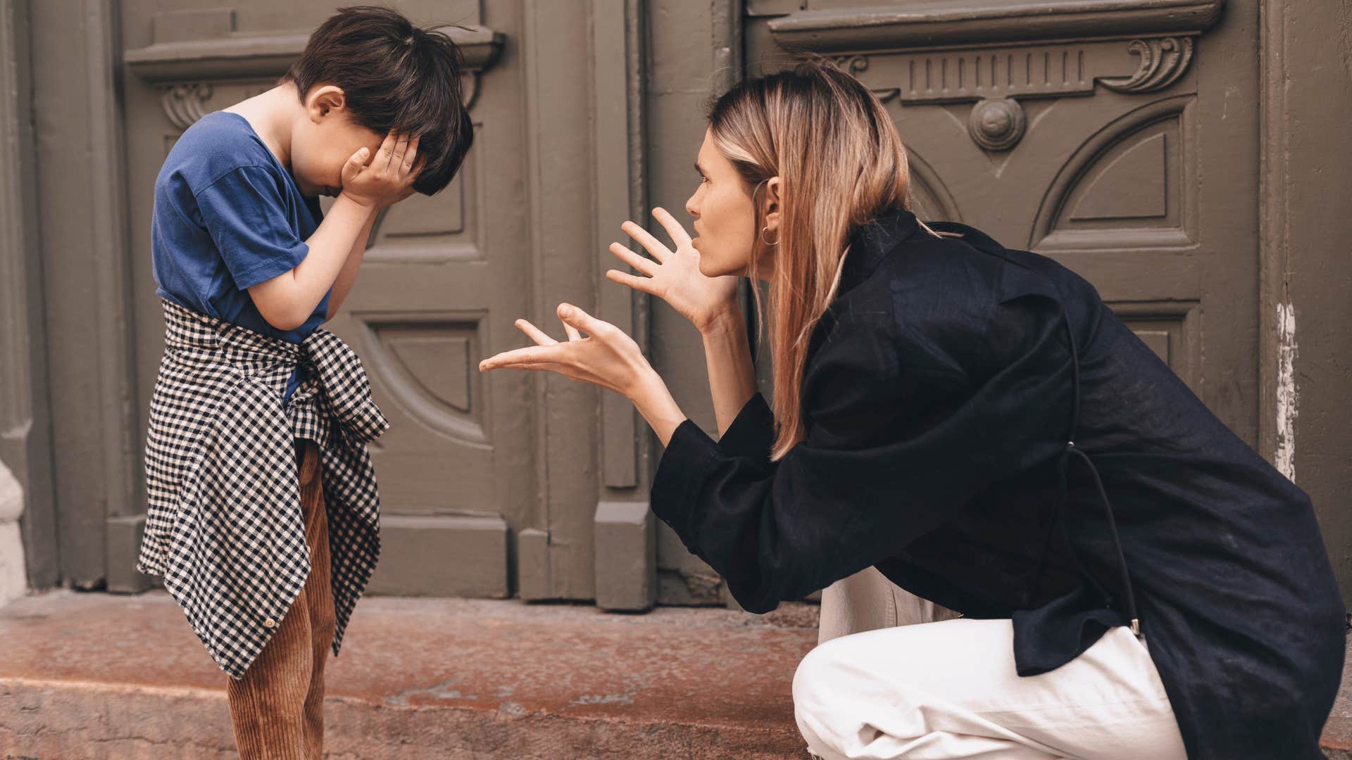 woman yelling at child outside