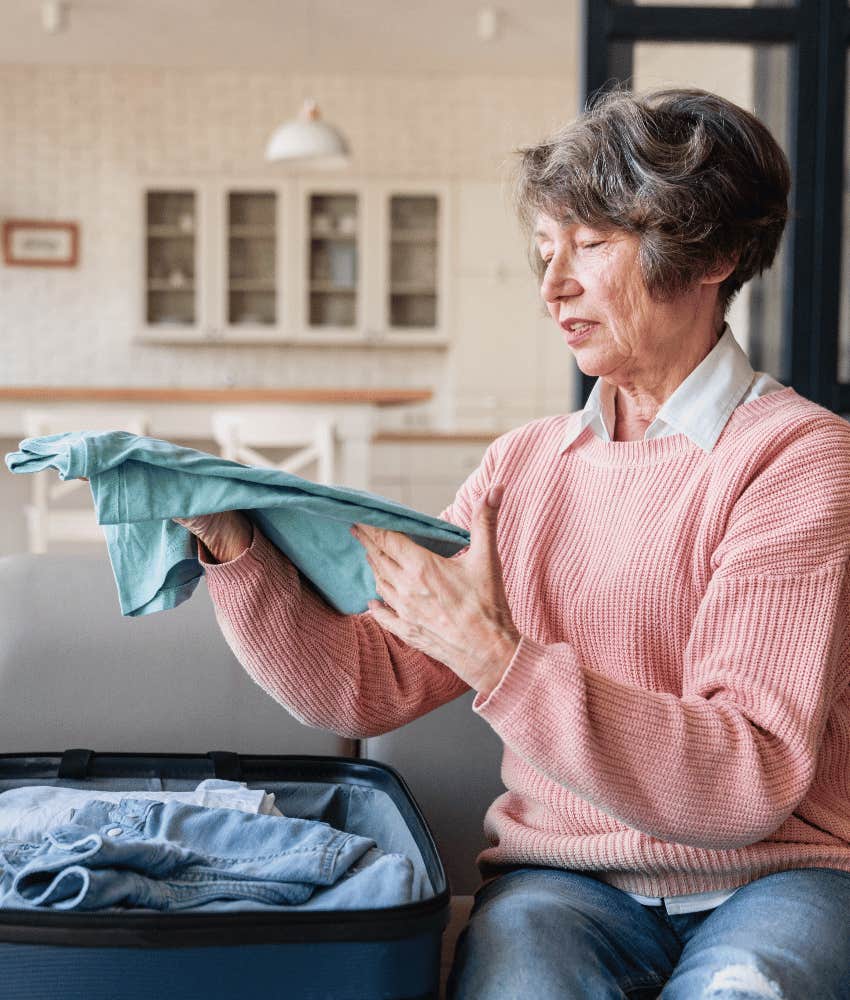 Mother-in-law packing suitcase