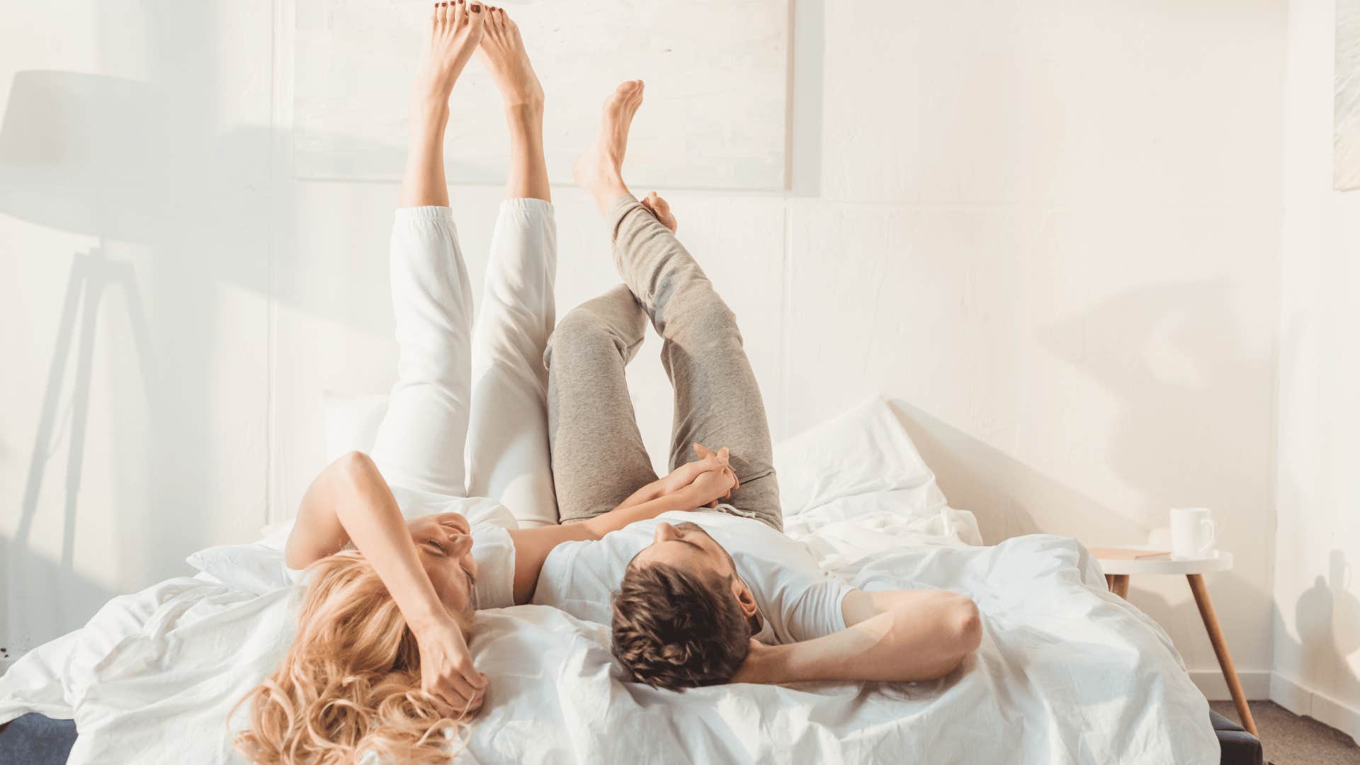 couple relaxing in bed