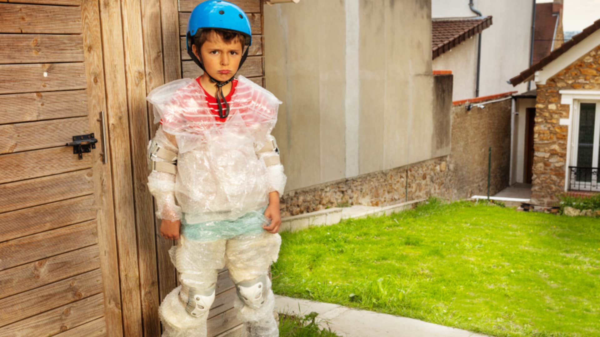 boy wrapped in bubble wrap