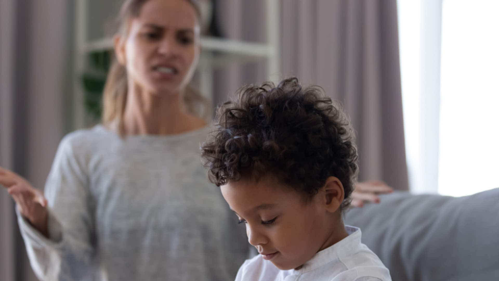 mother using shame to discipline young son