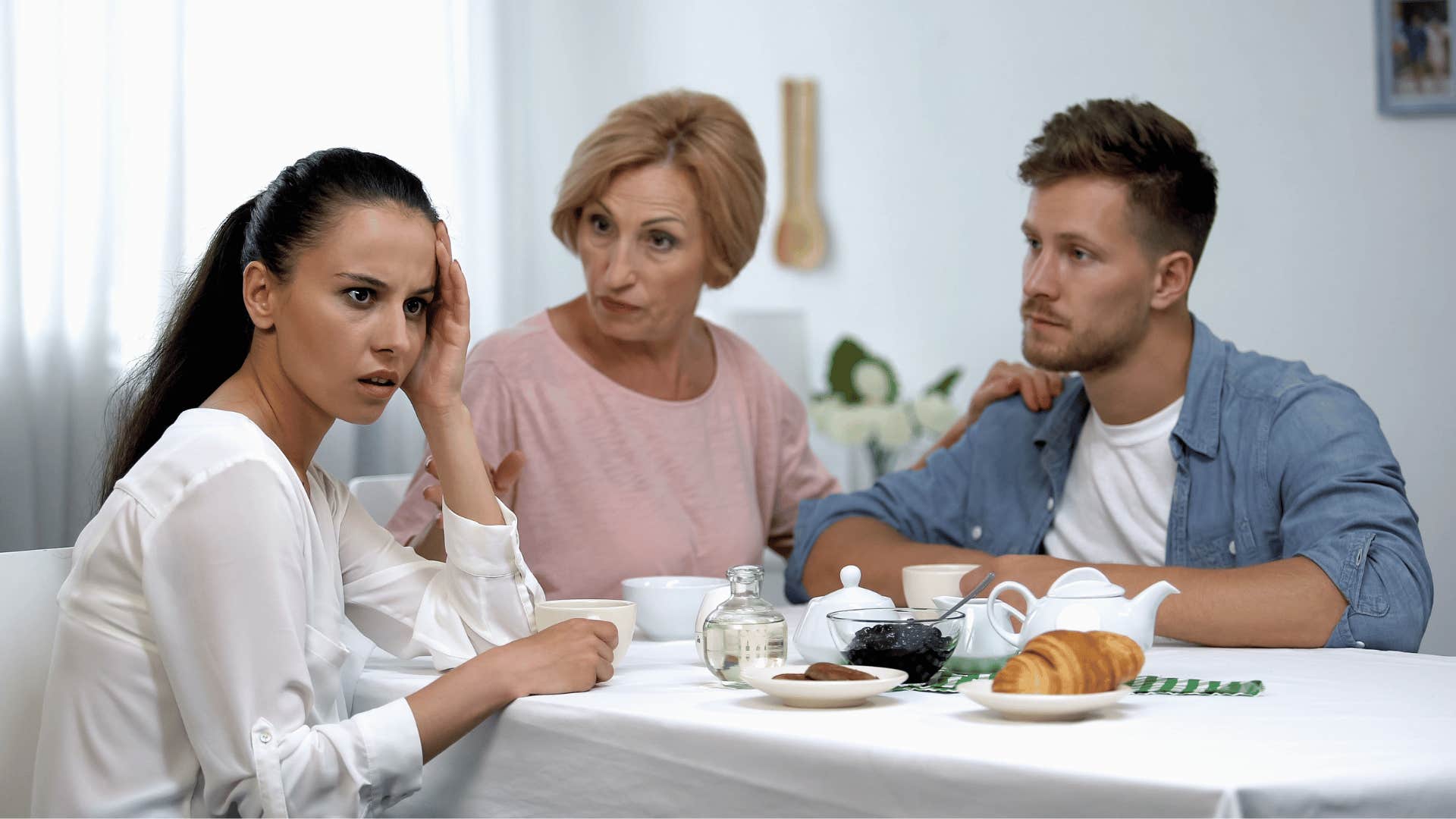 Couple has uncomfortable weal with older woman who wants obedience