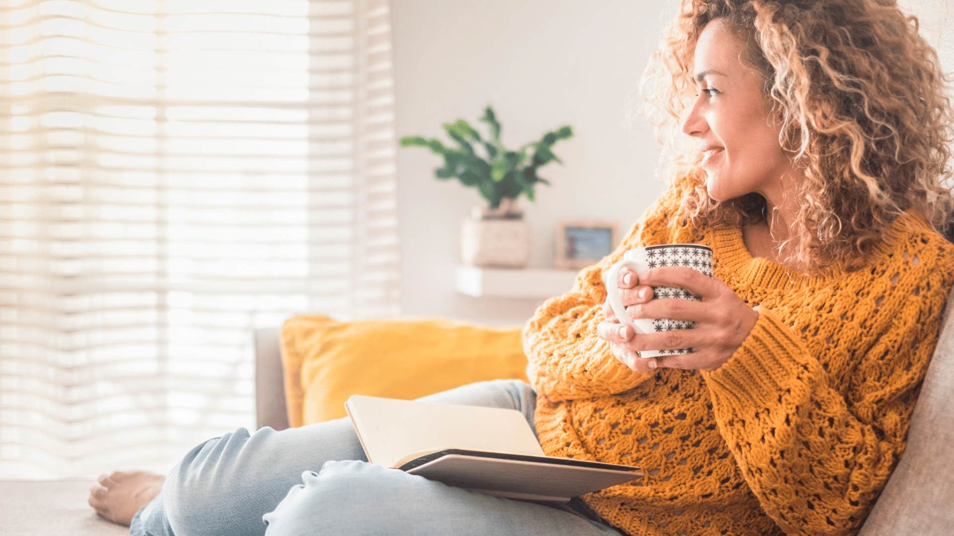 woman sitting and drinking tea