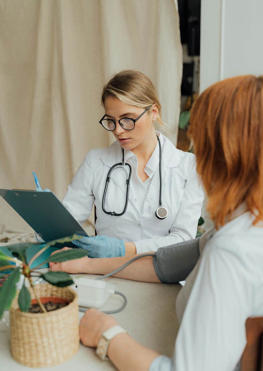 doctor examining cancer patient