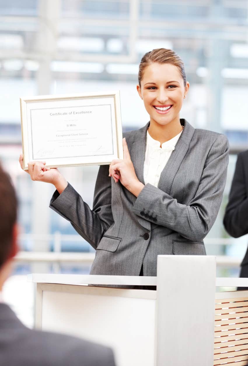 Woman born on 1, 10, 19, 23, or 28 receiving an award at work 