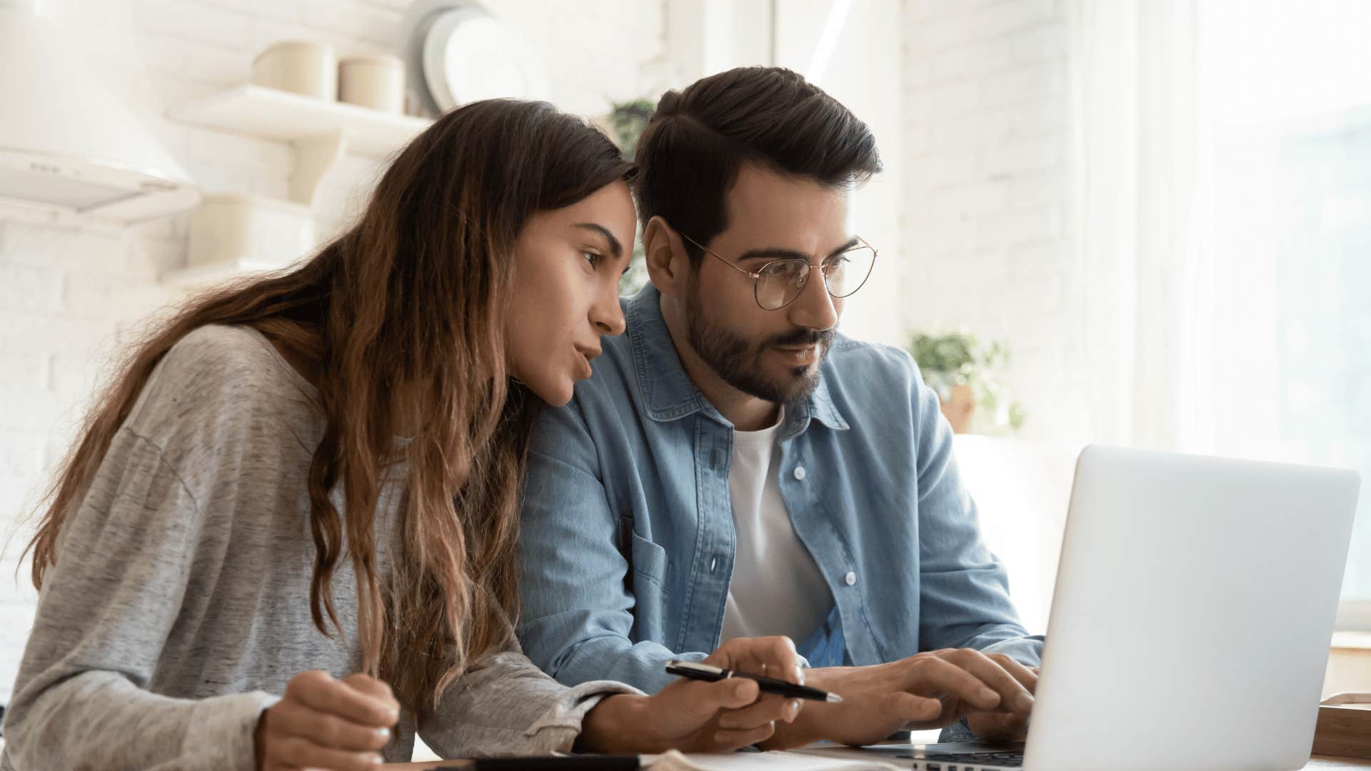 couple looking at laptop