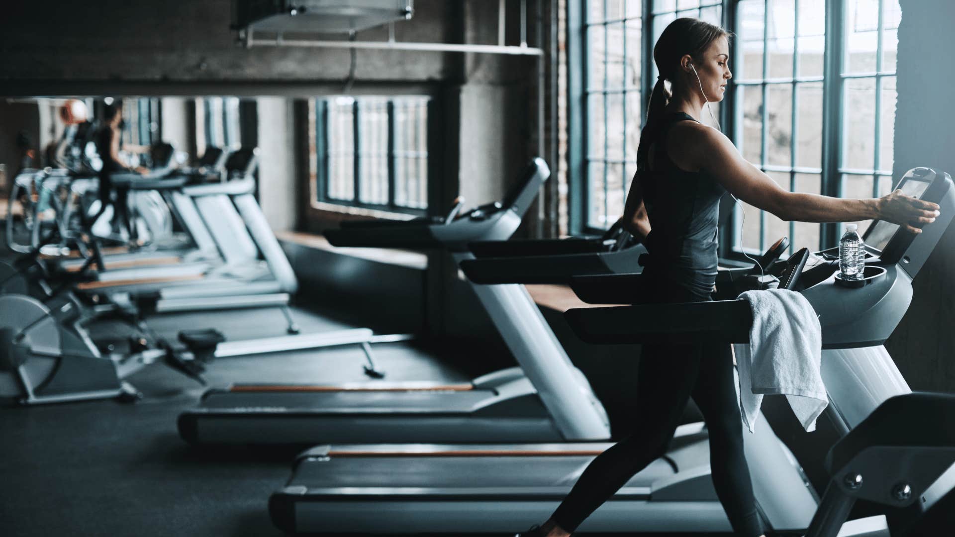 woman on treadmill at gym