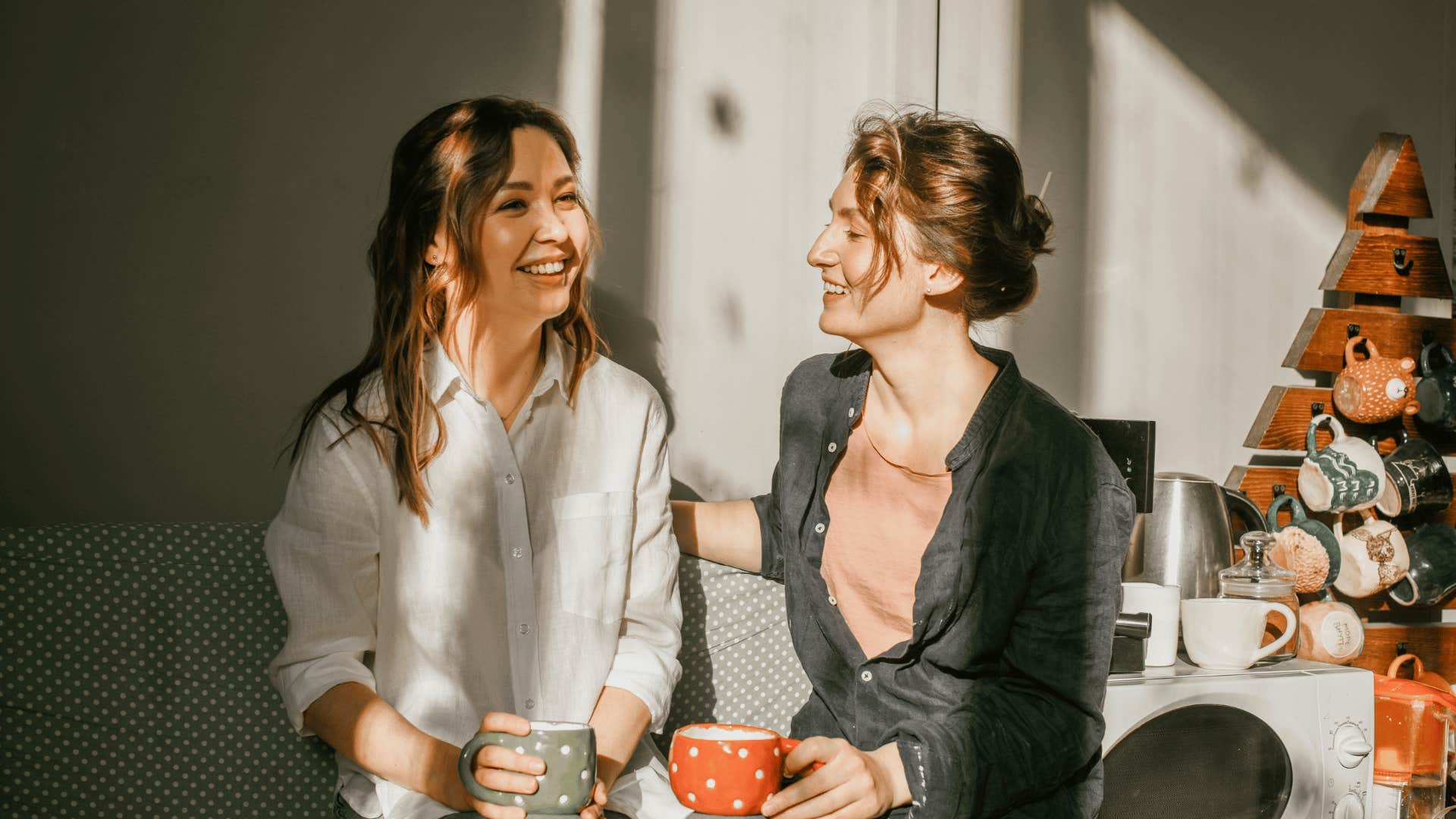 women drinking coffee and talking