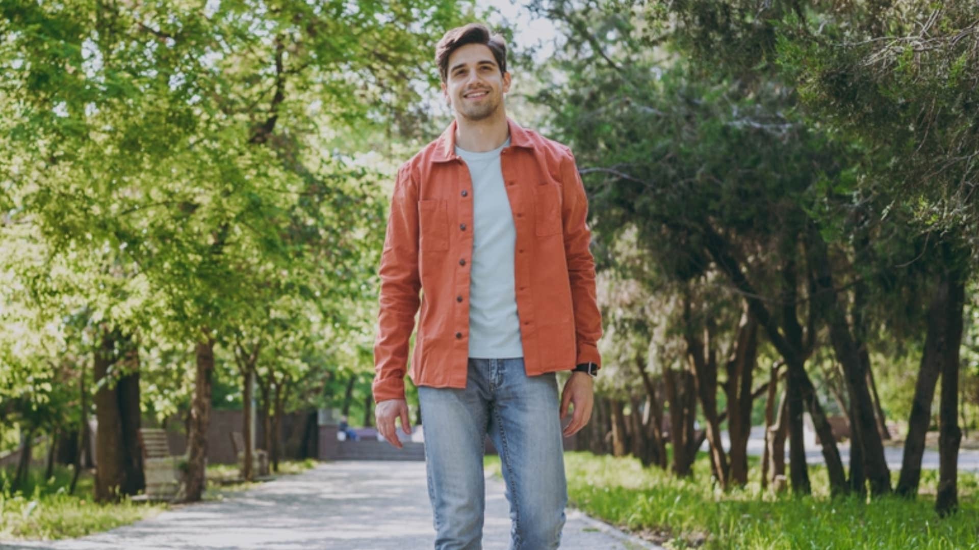 man taking a walk in nature