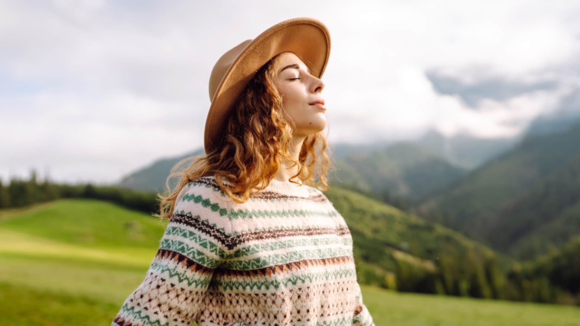 woman meditating outdoors