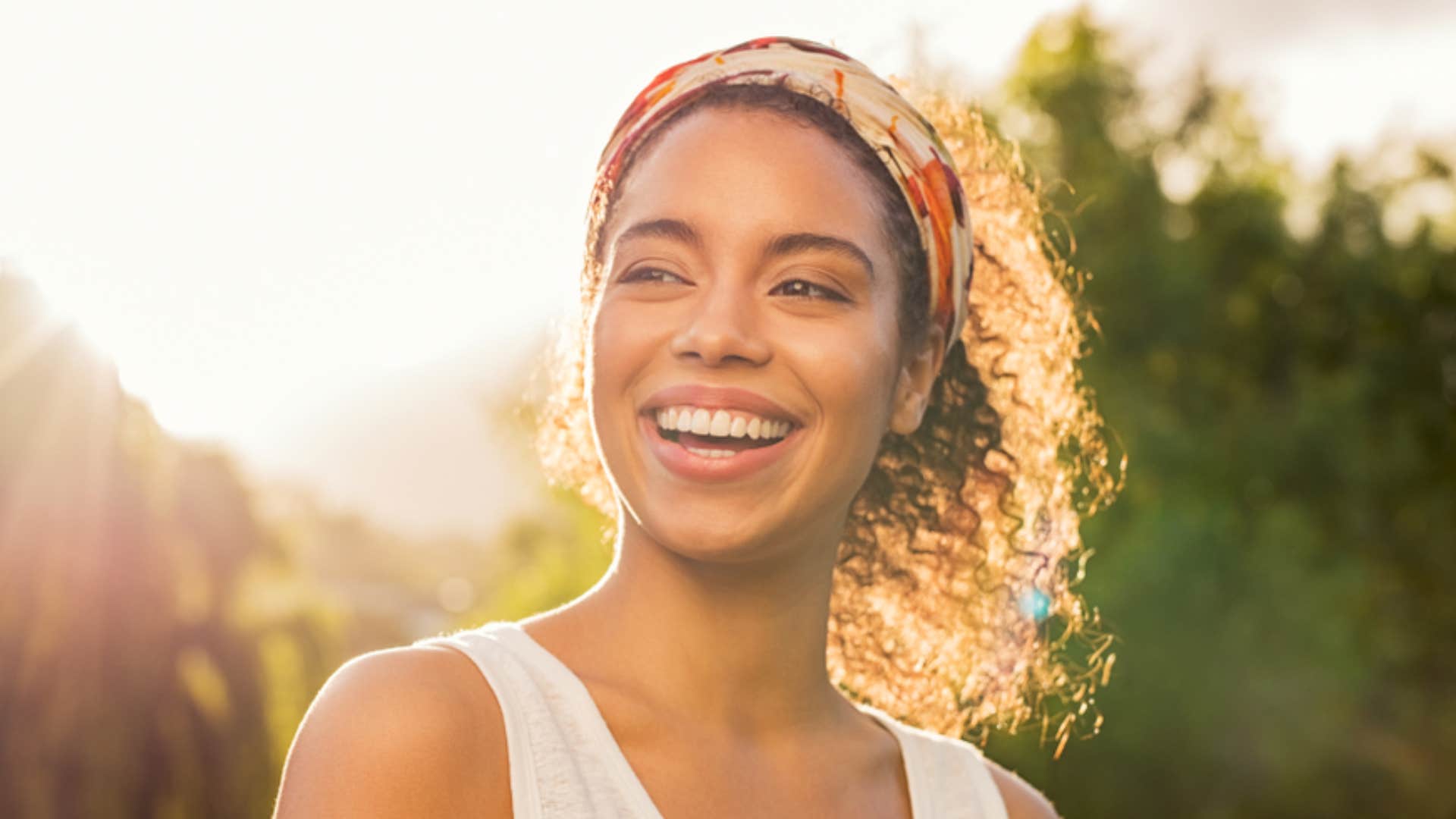 smiling woman in the sun