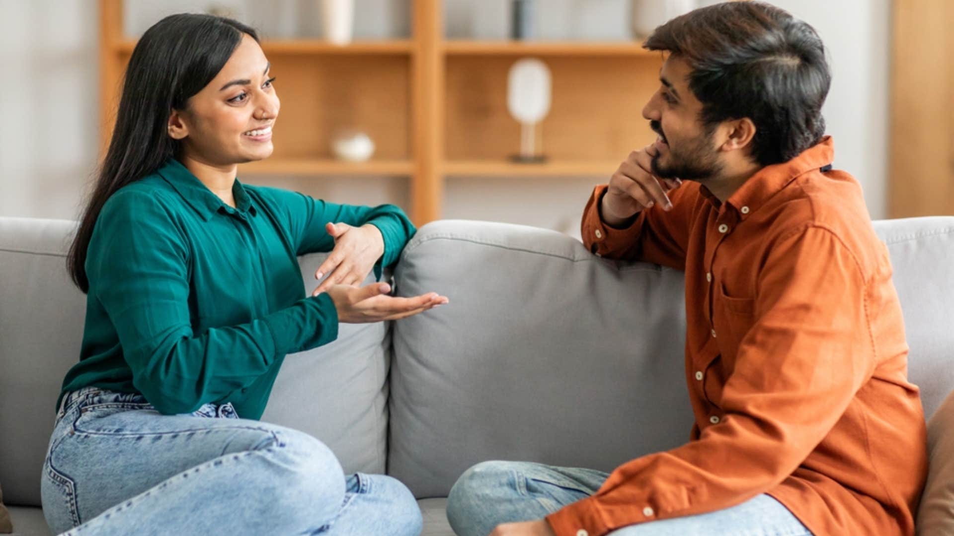 woman asking man for moment of silence in conversation