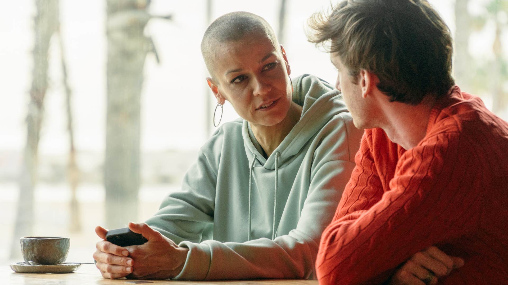 woman asserting herself in conversation