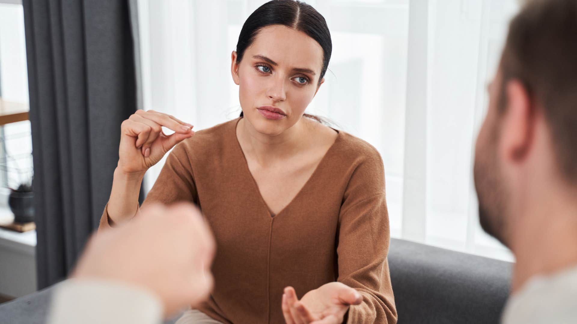 woman talking to man