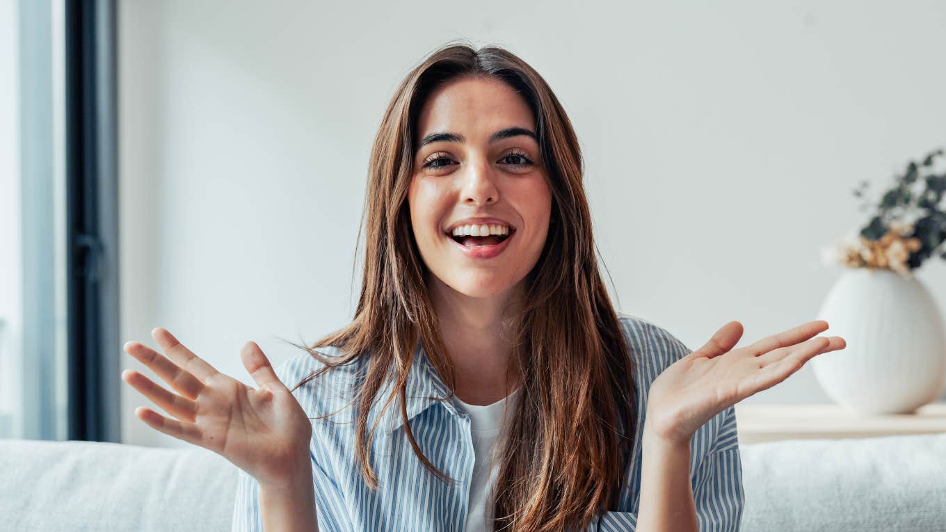 respected woman smiling with hand gestures