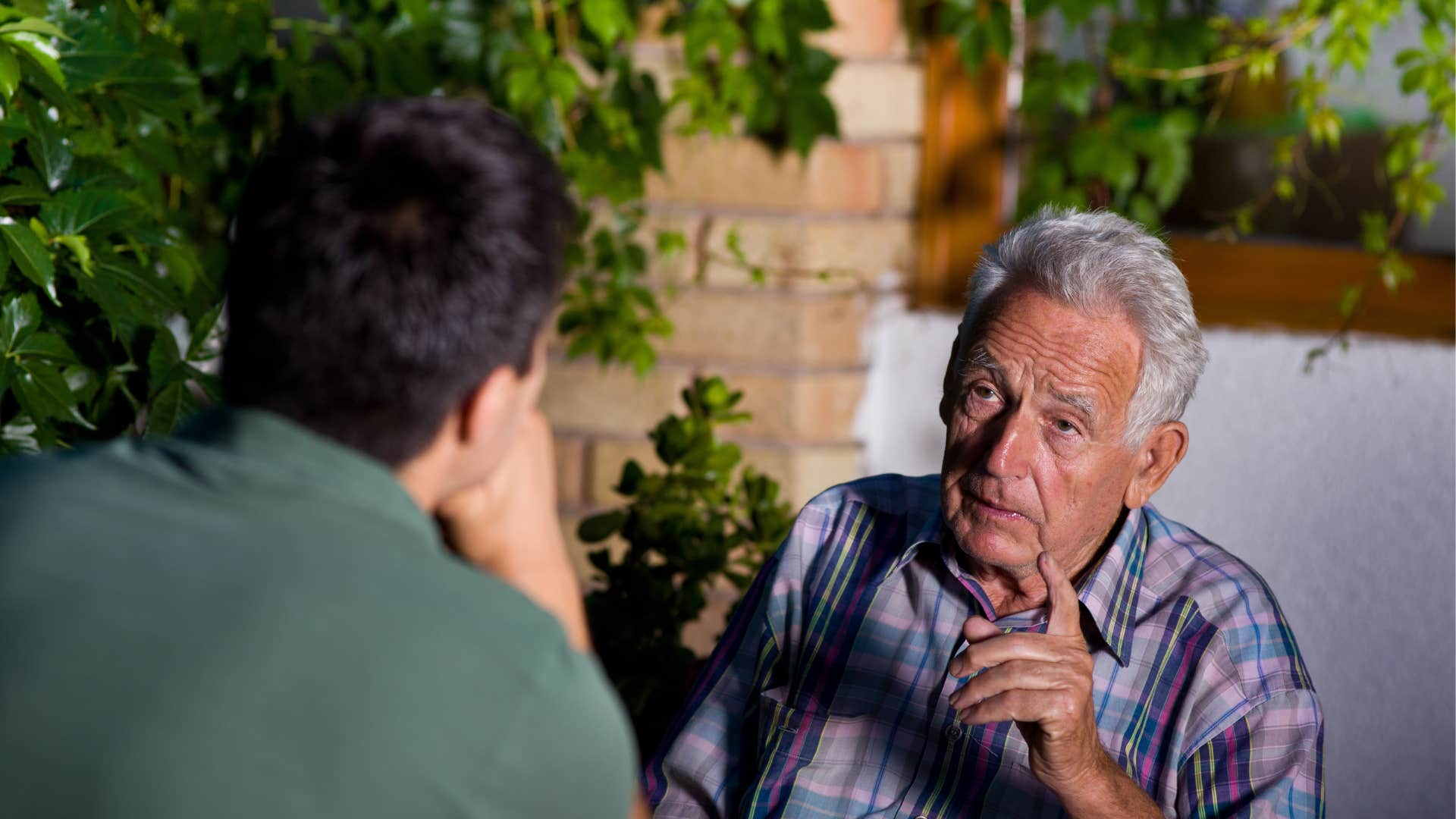 An elderly man tells his son that he misunderstood their situation.