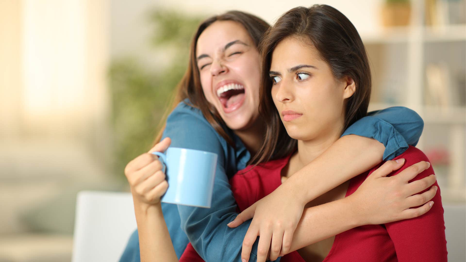 Woman over expressing herself to her friend drawing attention to herself