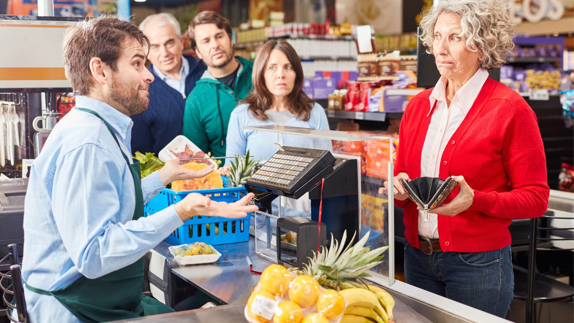 cashier telling a customer that she should tone it down