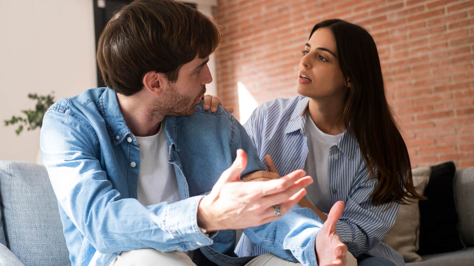 woman arguing with upset man