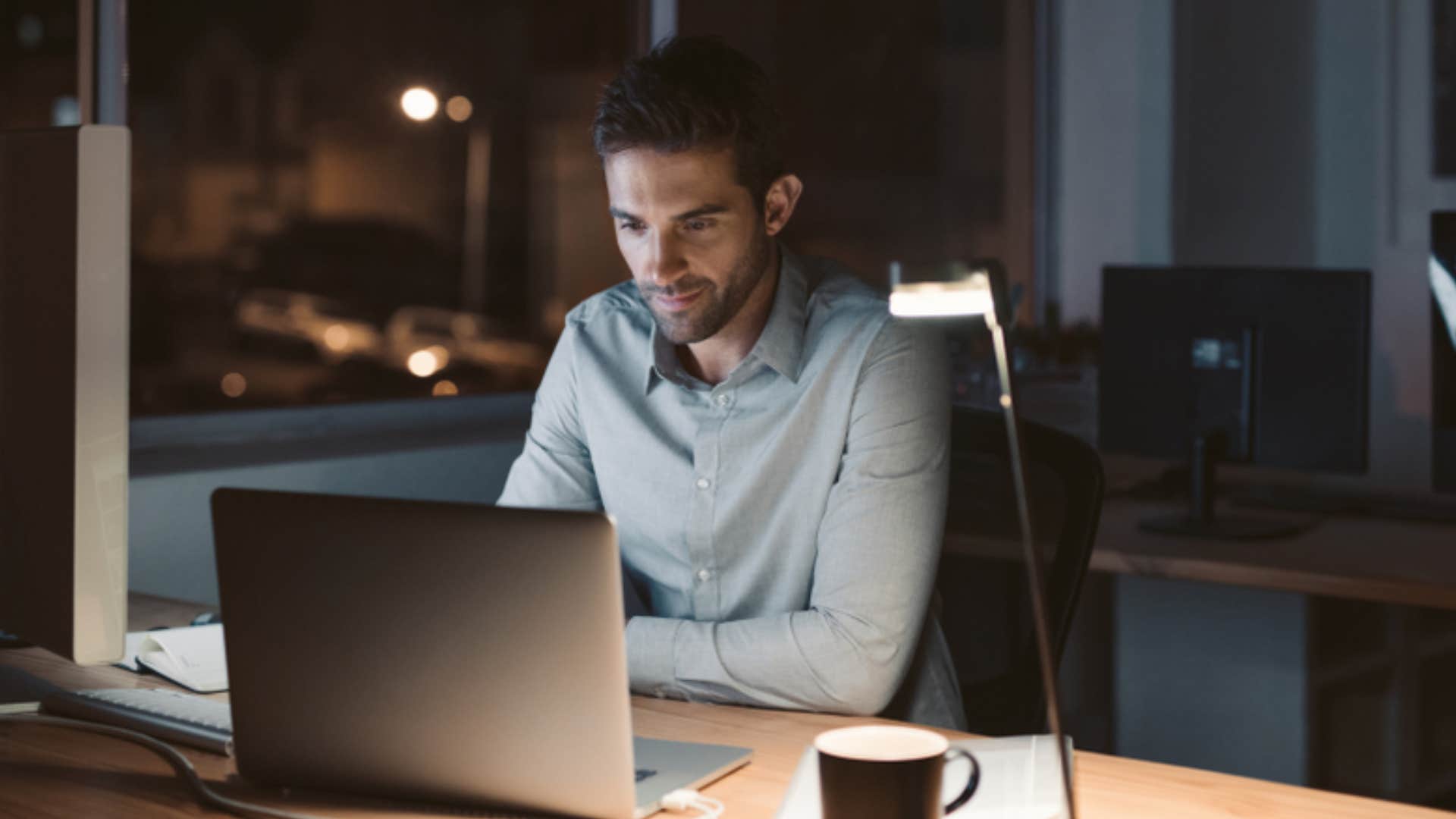 man working late into the night