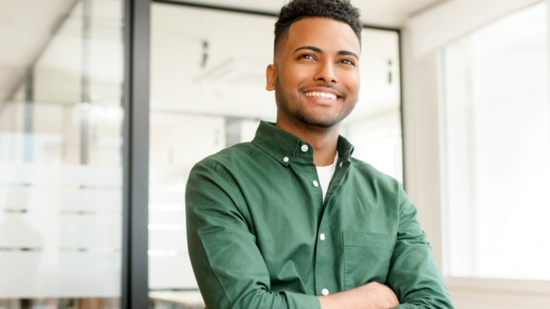 smiling professional man working on his personal growth