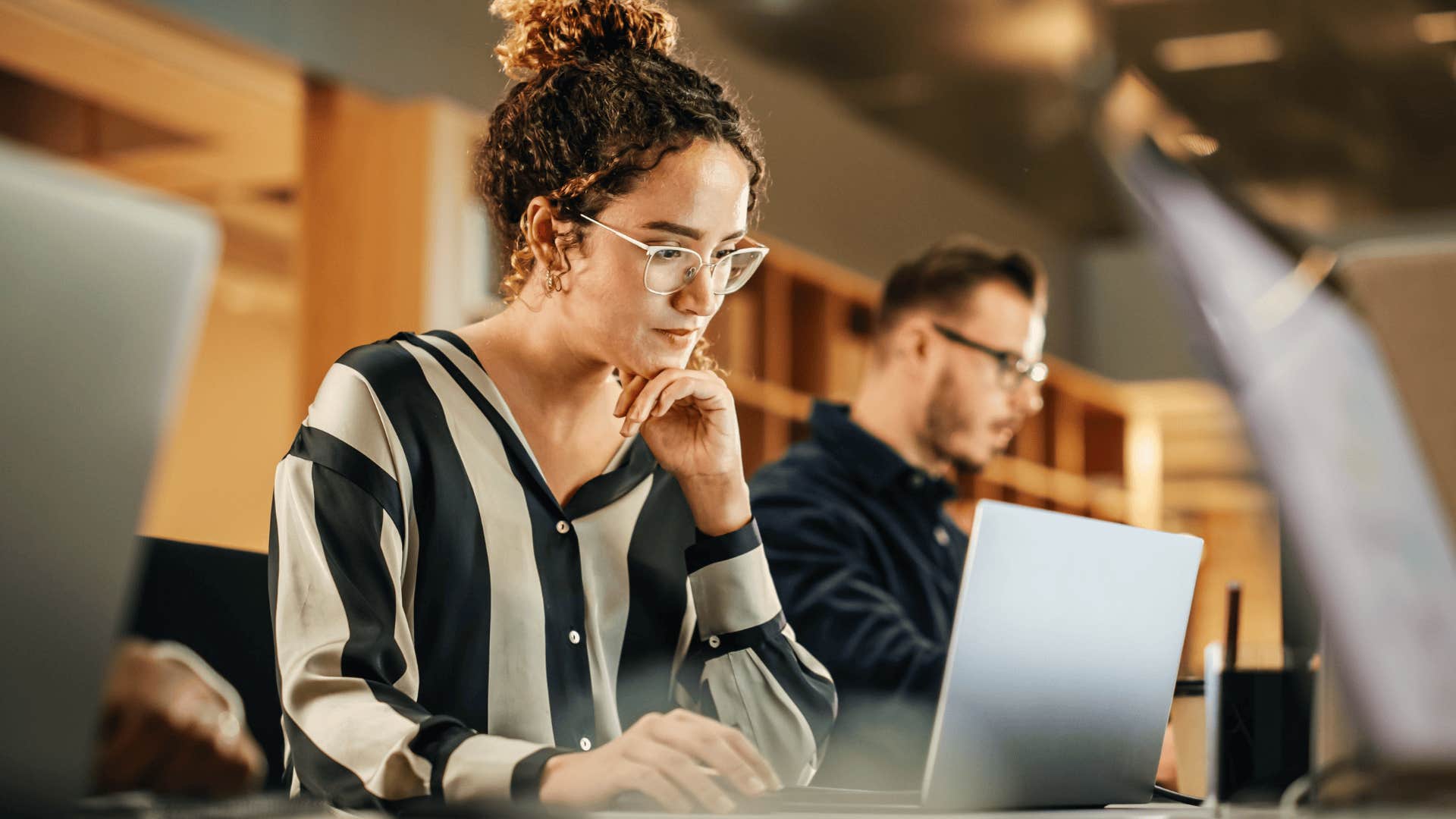 professional woman working on laptop