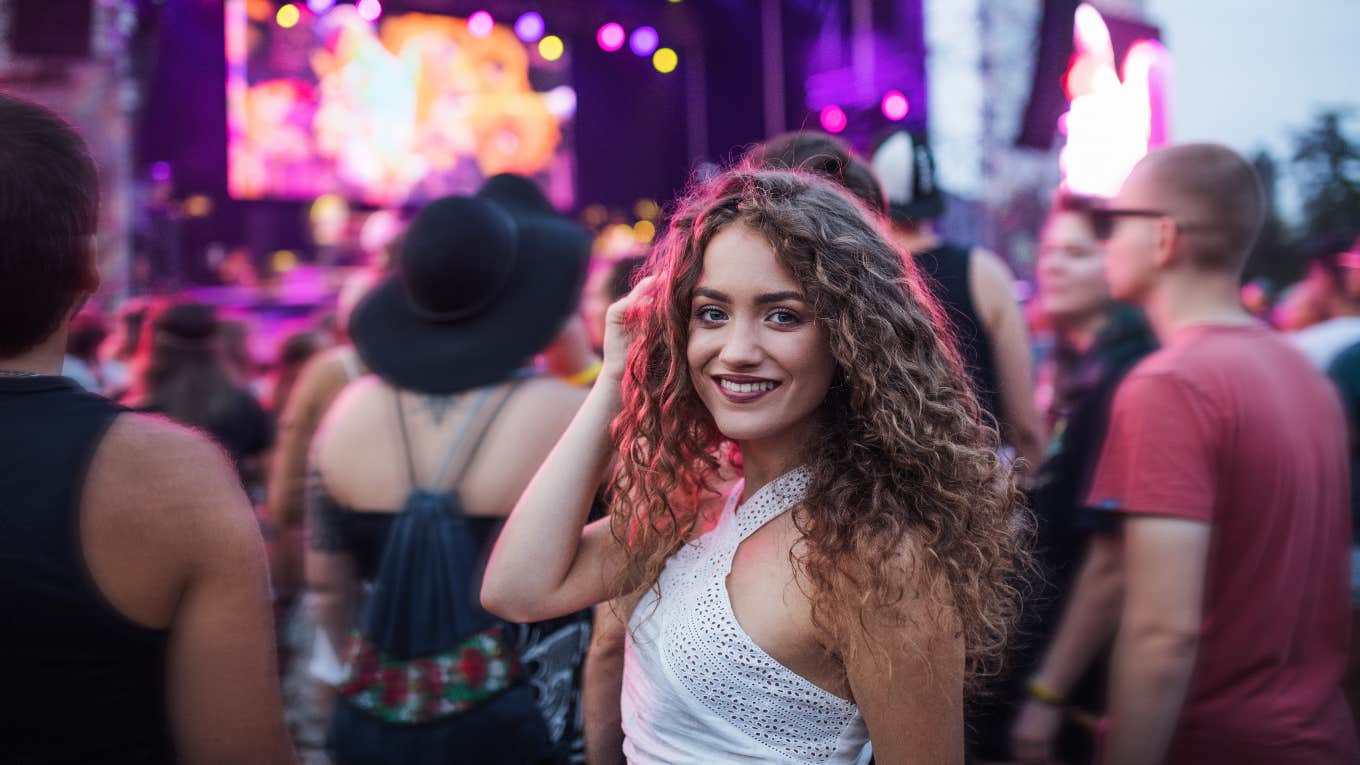 Happy woman at a concert