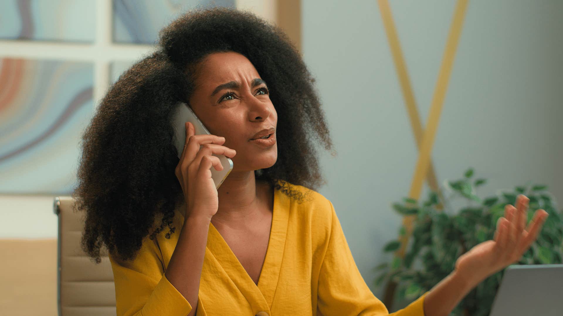 Woman on the phone explains to untrusting jealous person