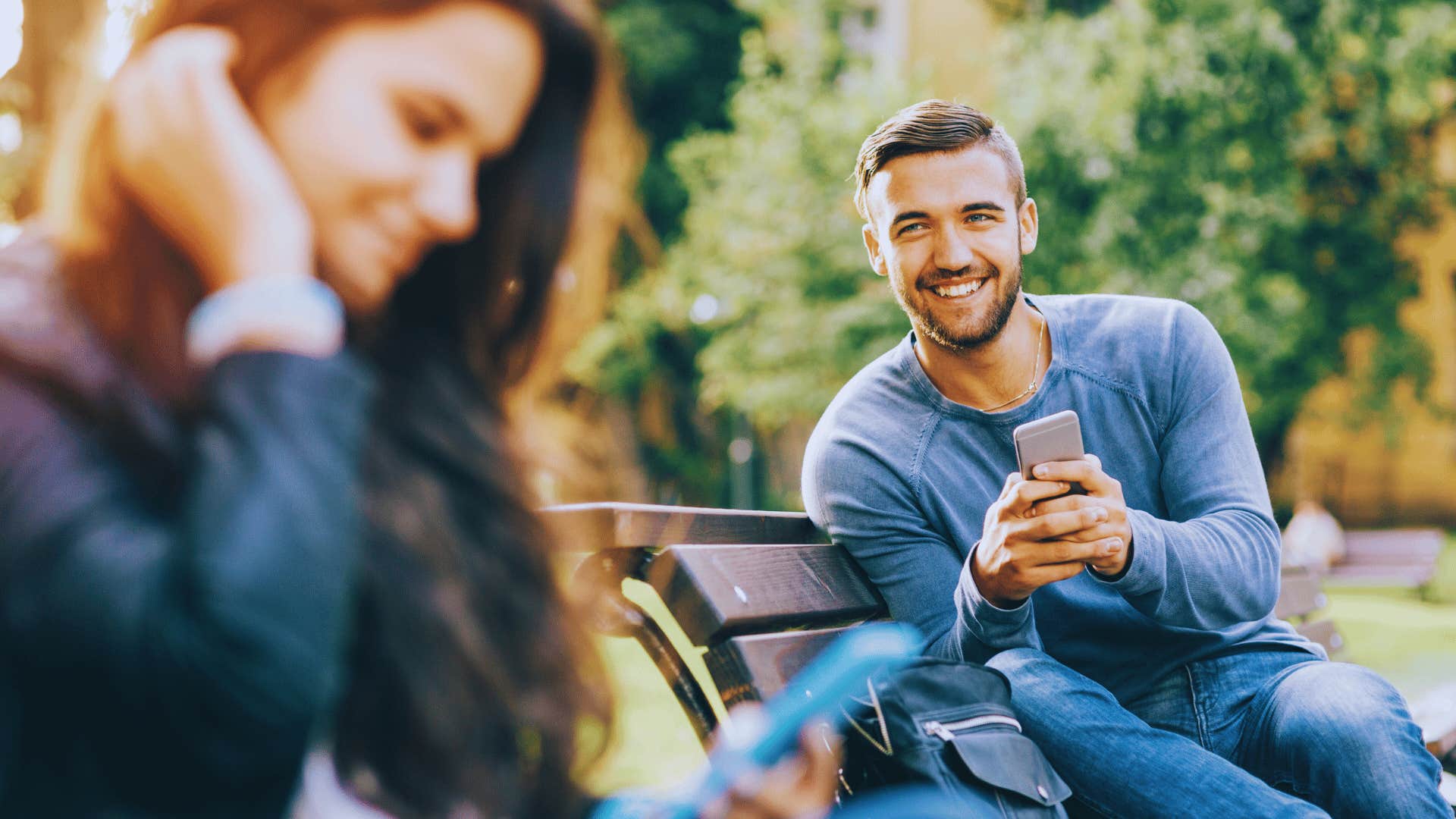 woman getting nervous and fidgety sitting next to man she is attracted to