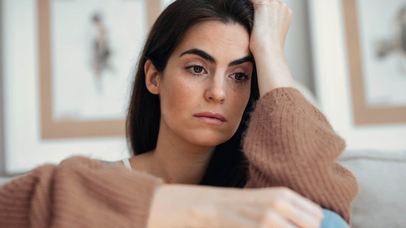 woman stressed from the effects of her childhood