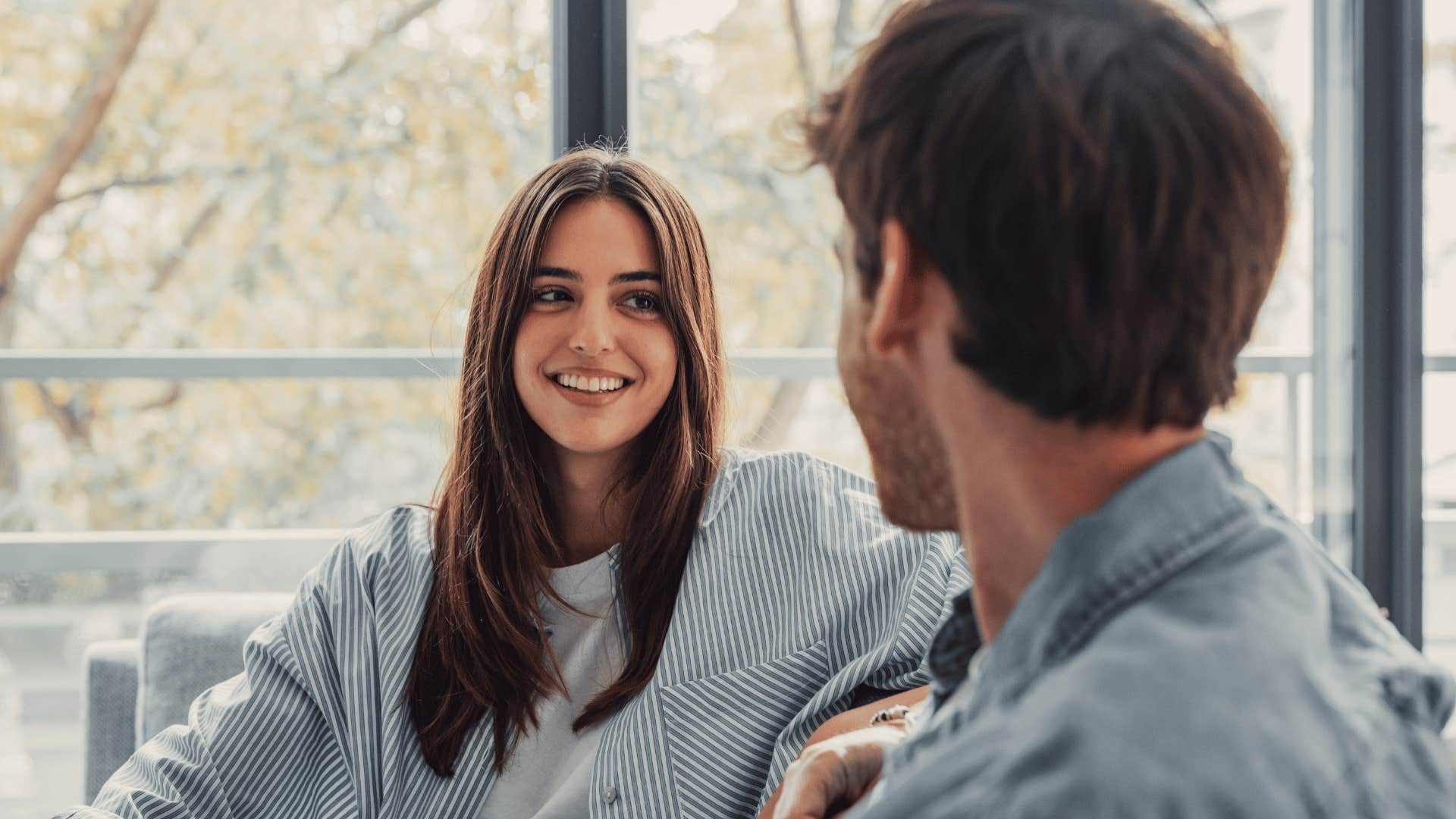 couple with unspoken mutual attraction maintaining eye contact