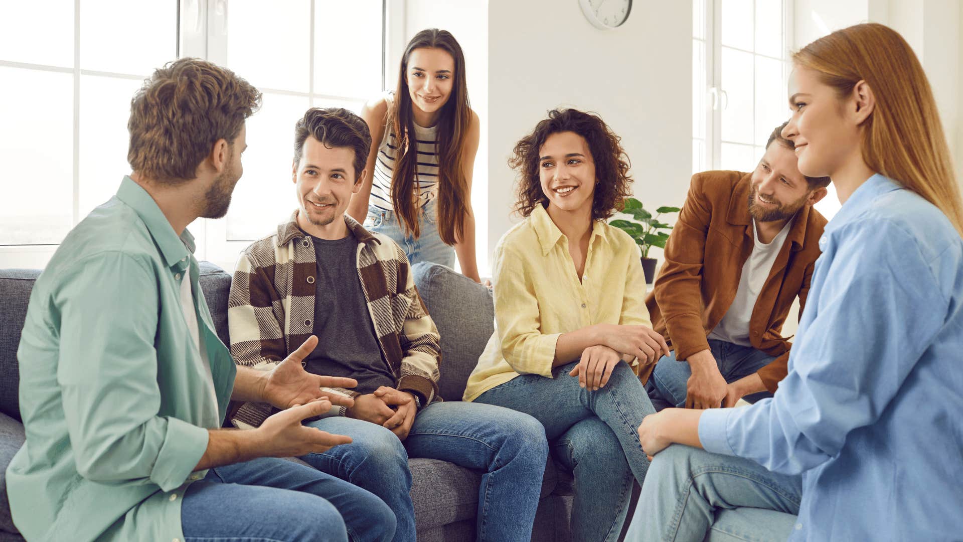 woman subtly competing for attention in a group