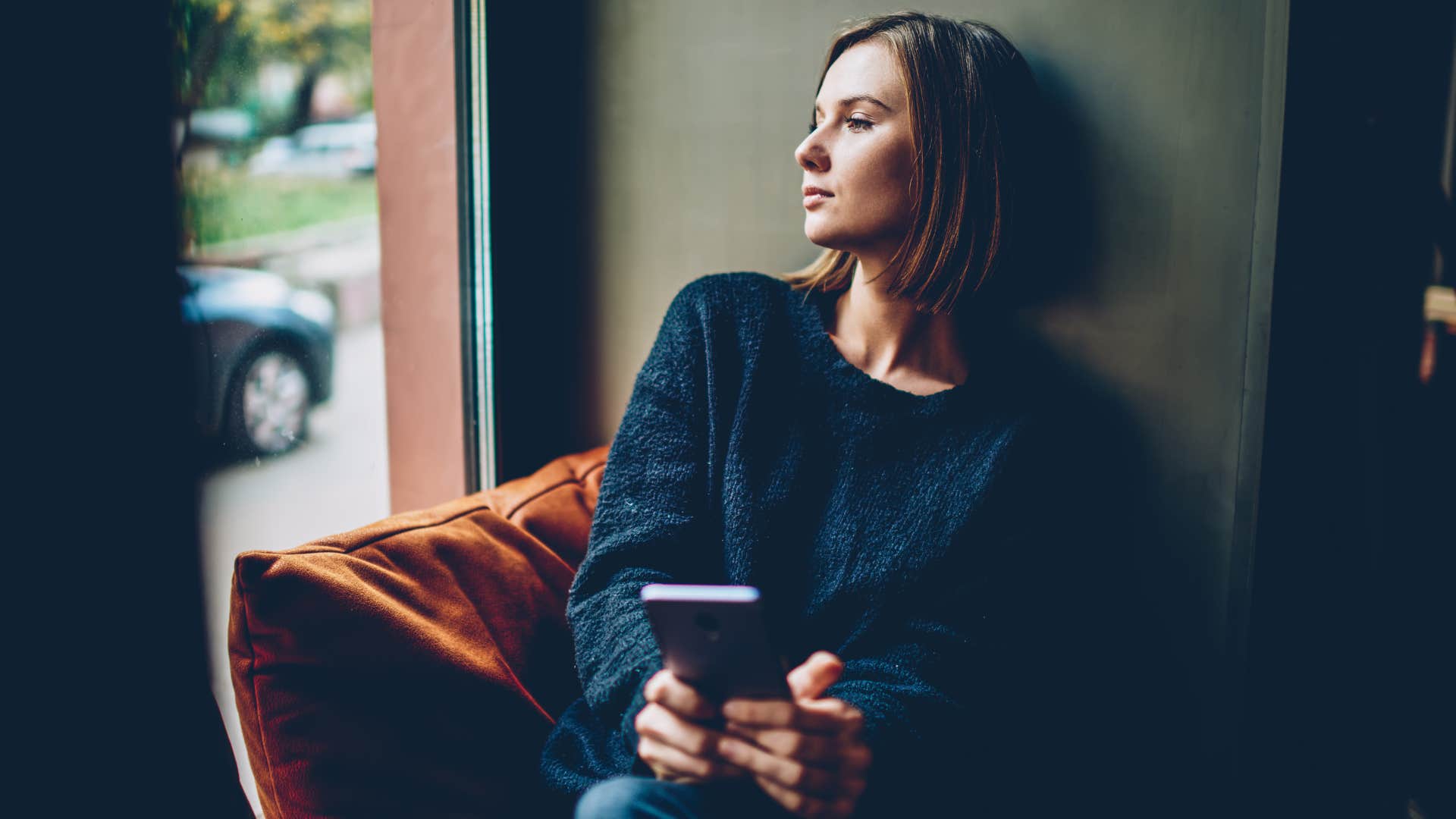 isolated woman sitting alone