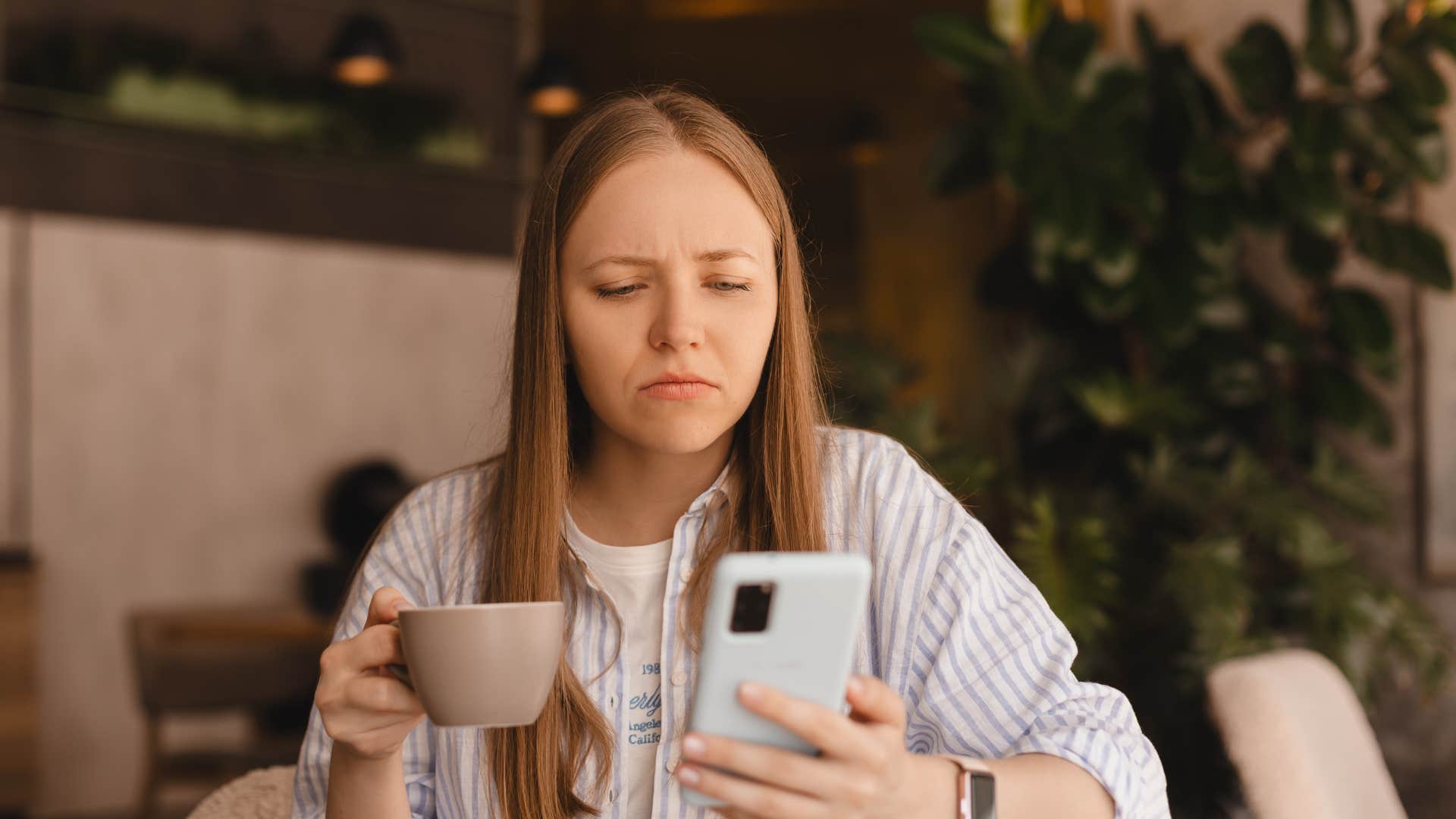 woman distracting herself on her phone