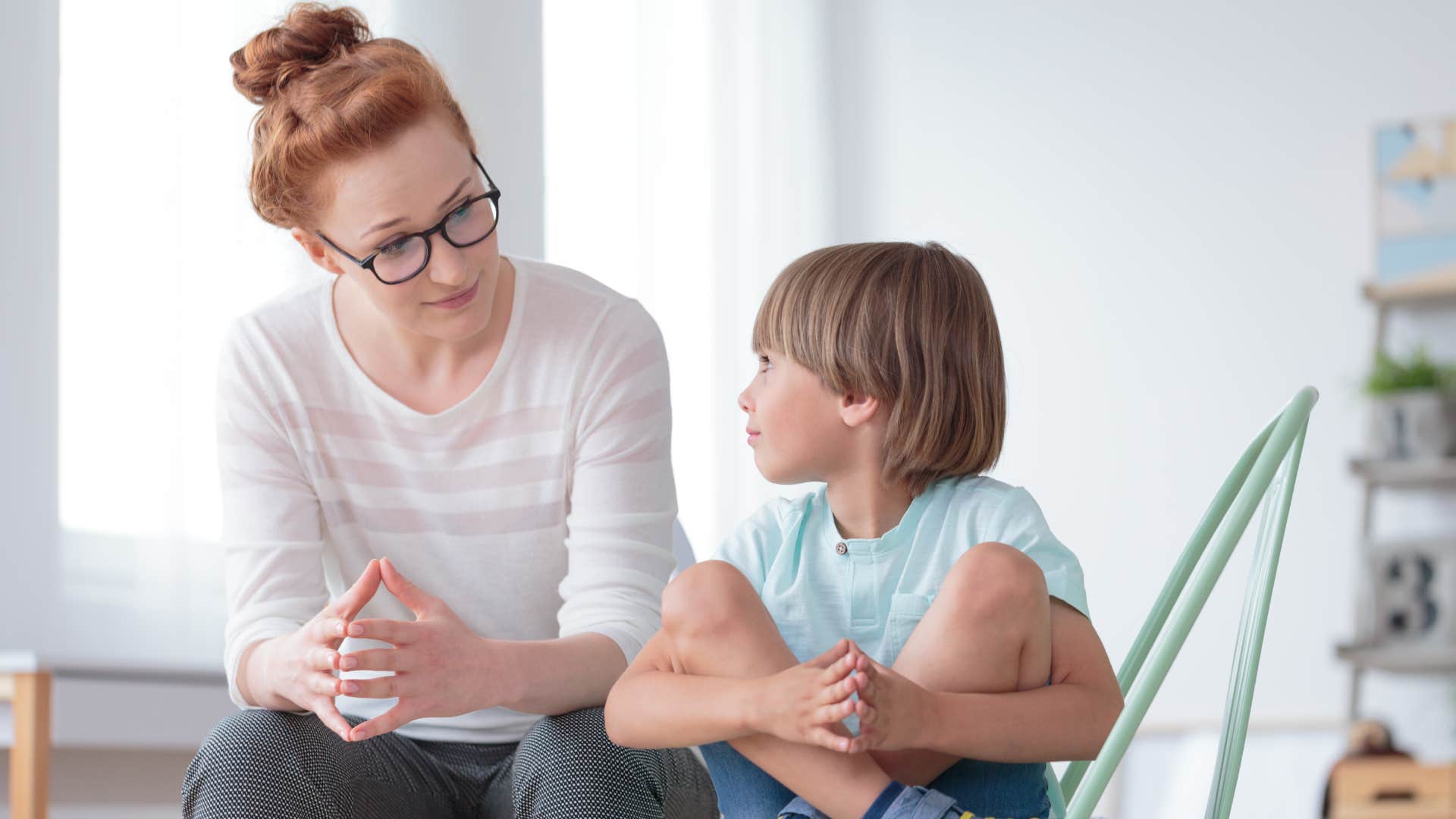 mom teaching son manners