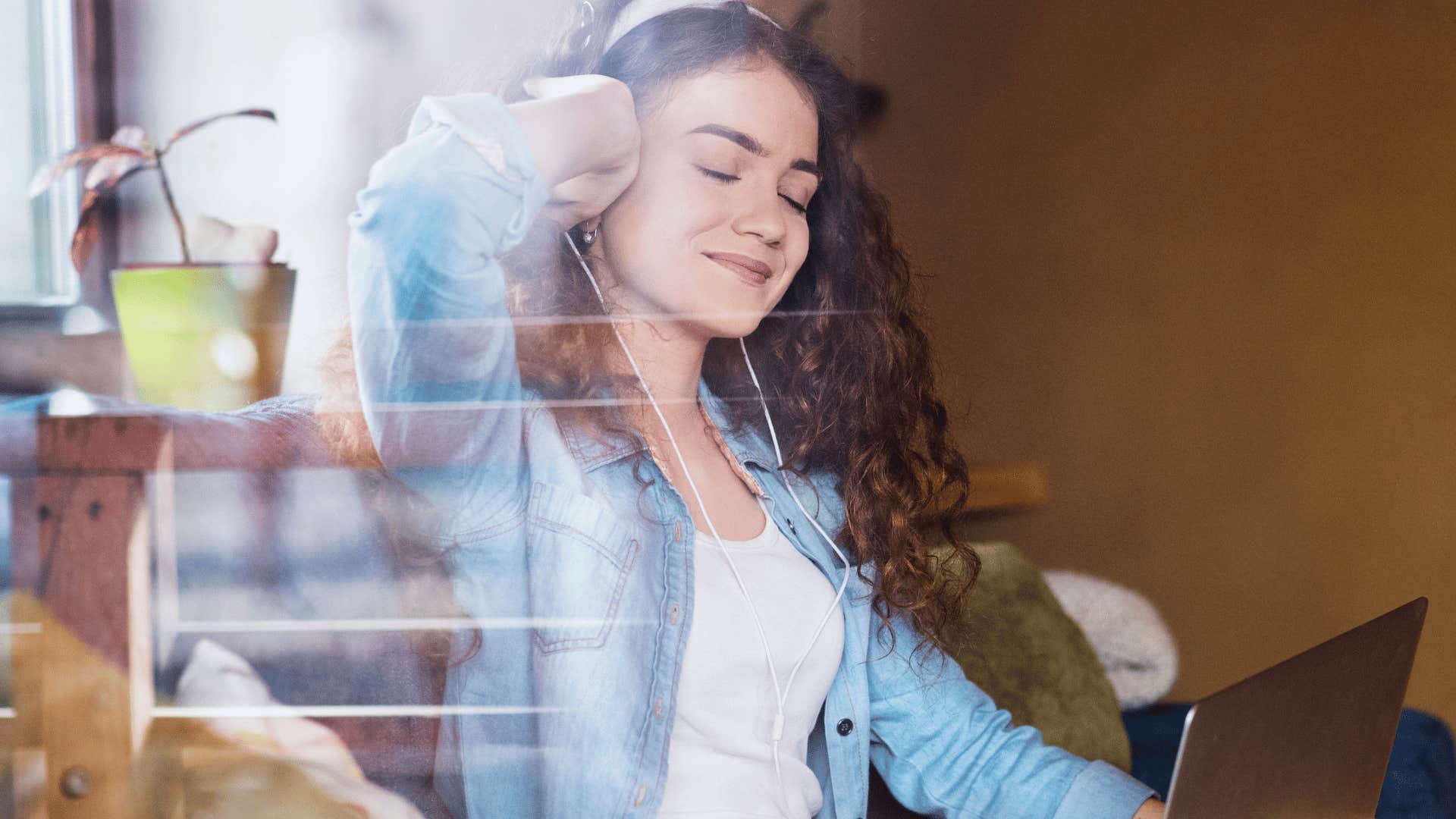 woman listening to affirmations