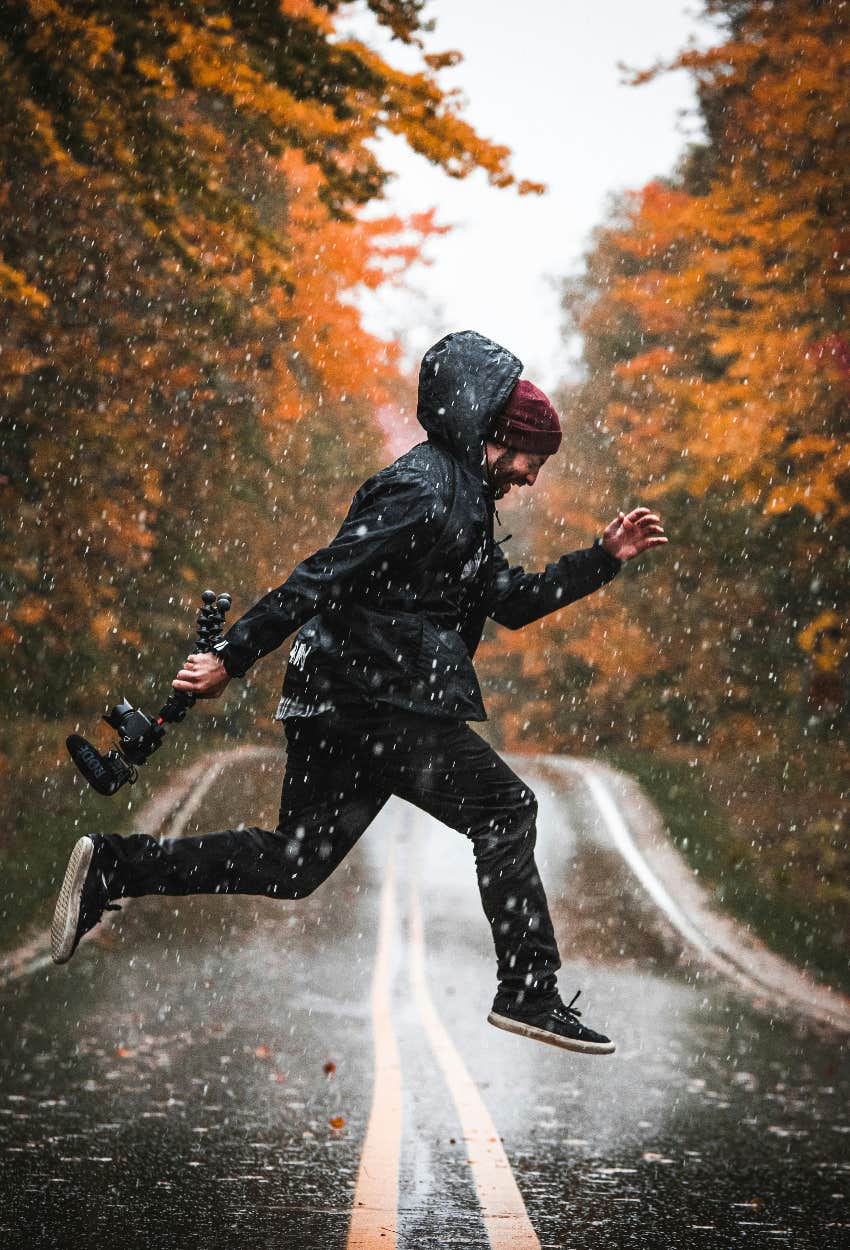 spiritual meaning rain birthday man jumping rainy day