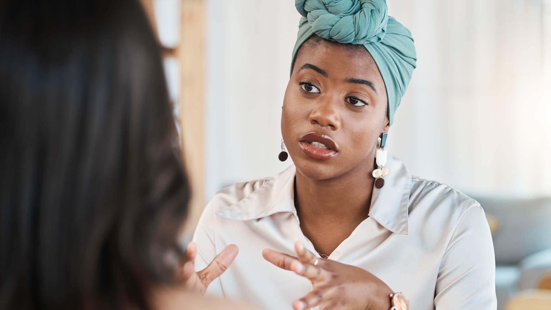 manipulative woman refusing to give second chances and having a conversation with a peer about behavior