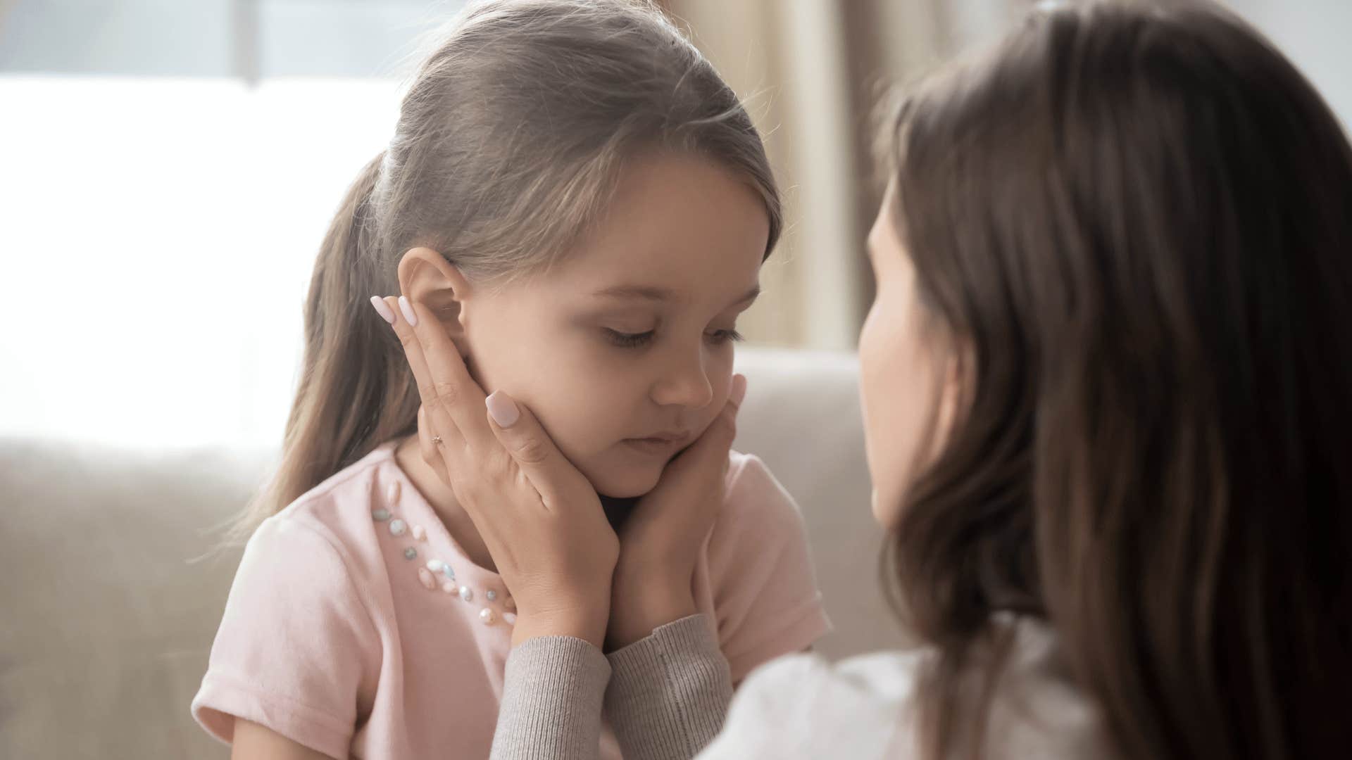 upset child with mother